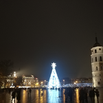 ECards for the New 2025 year by email Postcard with a Christmas tree near the cathedral